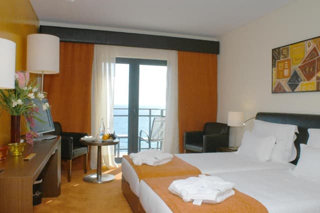 Twin Room with Sea View and Extra Bed (2 Adults + 1 Child)
