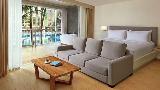 Deluxe Suite, 1 King Bed with Sofa bed, Balcony, Pool View