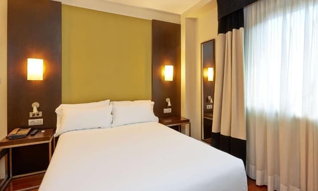 Family Adjoining Room with Extra Bed (3 Adults + 2 Children)