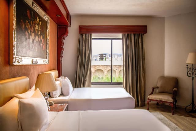 2 DOUBLE BEDS JUNIOR SUITE