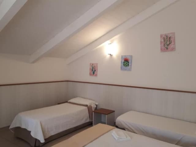 Posto letto in camerata mista da 8 posti con bagno interno