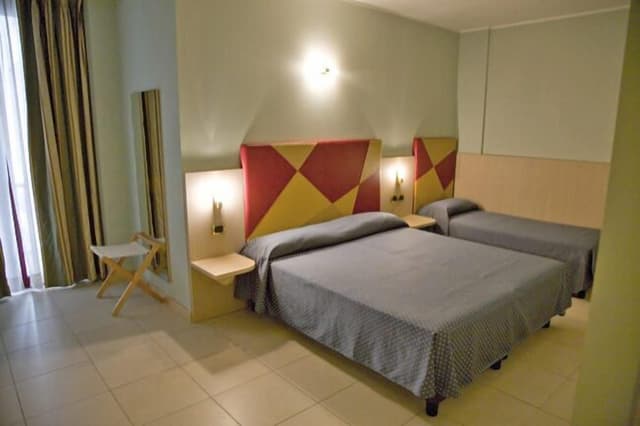 Standard Triple Room, wall view, no balcony