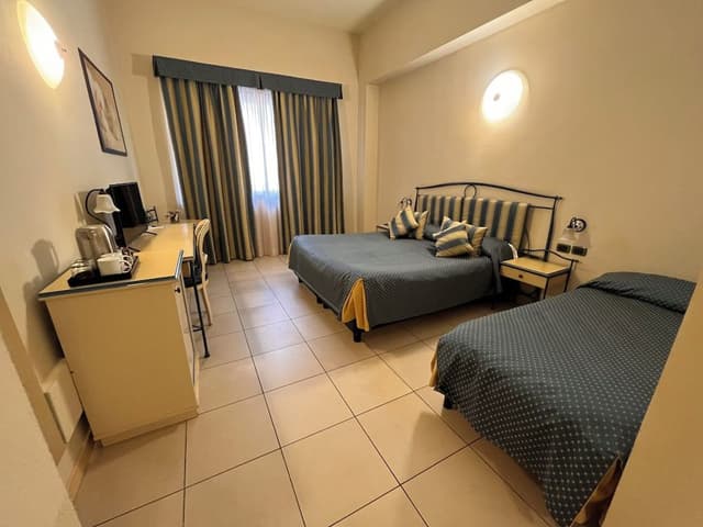 Standard Triple Room, wall view, no balcony