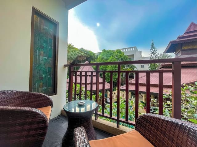 Deluxe Balcony King Pool View