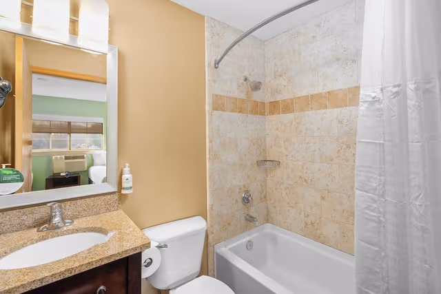 One-King and Two-Double Beds - One Bedroom Suite