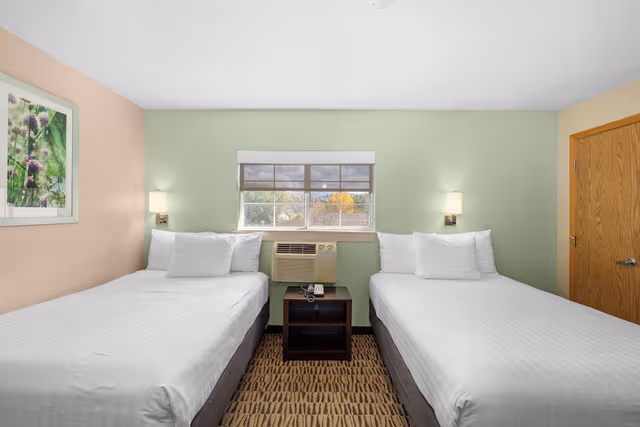 One-King and Two-Double Beds - One Bedroom Suite