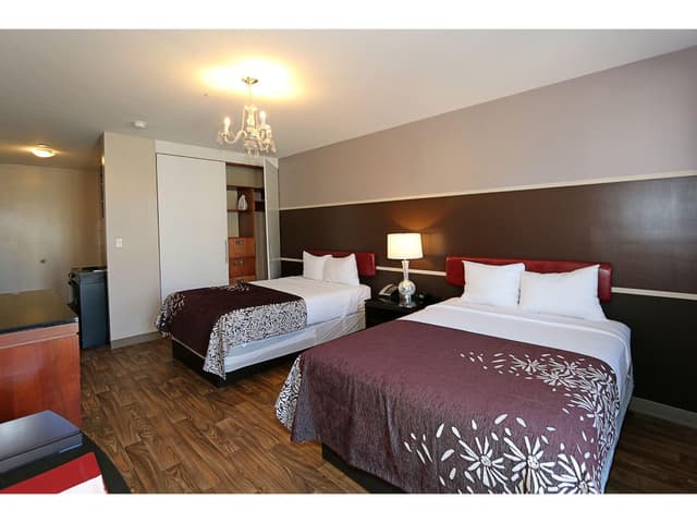 Executive Two Double Beds with Balcony and Kitchenette