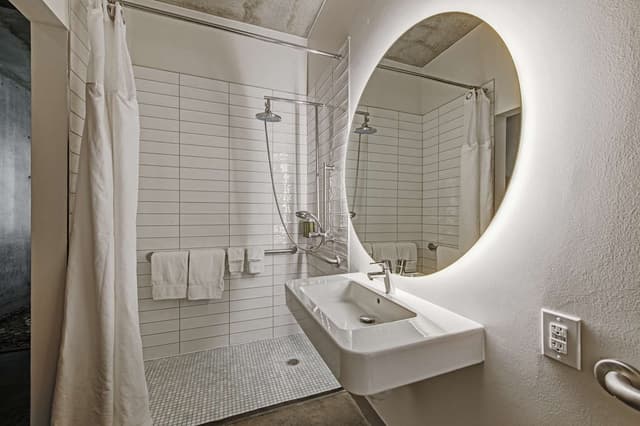 1 KING MOBILITY ACCESSIBLE W/ ROLL IN SHOWER