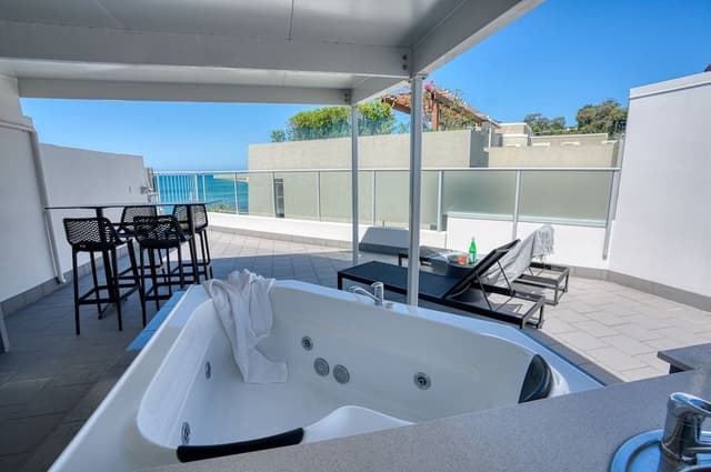 One Bedroom Partial Beach View Spa Penthouse