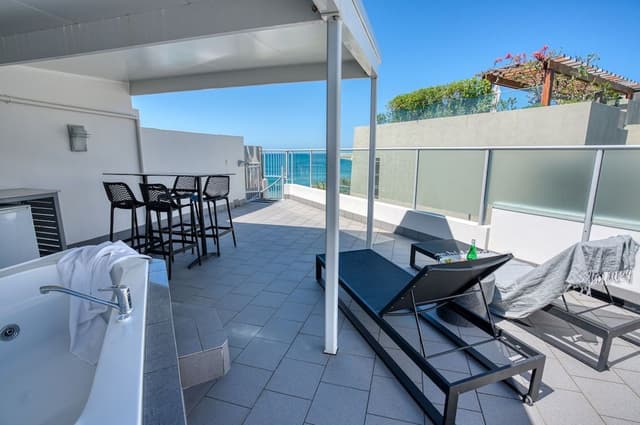 One Bedroom Partial Beach View Spa Penthouse