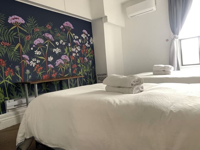 Economy Double or Twin Room, 2 Queen Beds, Non Smoking, Shared Bathroom