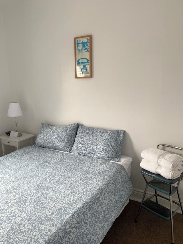 Economy Double Room, 1 Queen Bed, Non Smoking, Shared Bathroom
