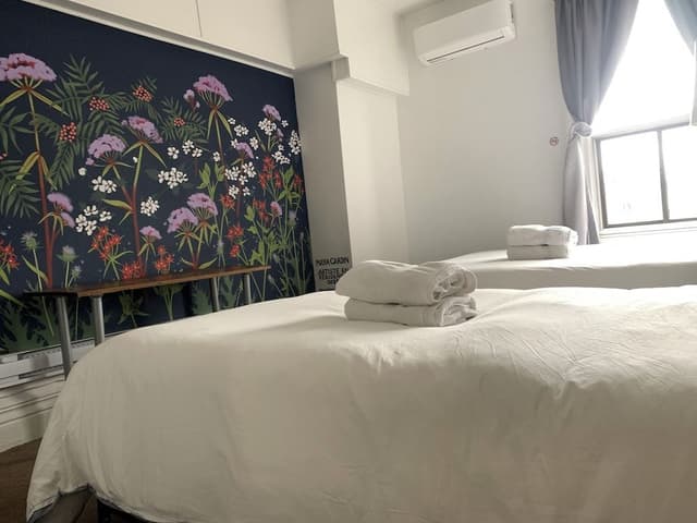 Economy Double or Twin Room, 2 Queen Beds, Non Smoking, Shared Bathroom