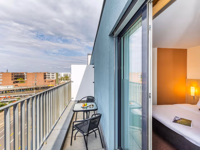 Panorama room with double bed and balcony