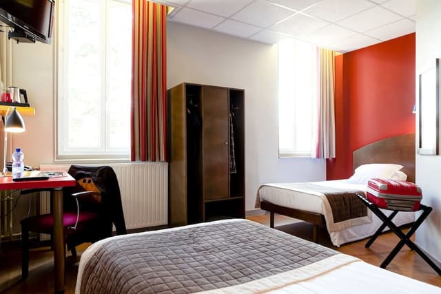 Room with two separate single beds