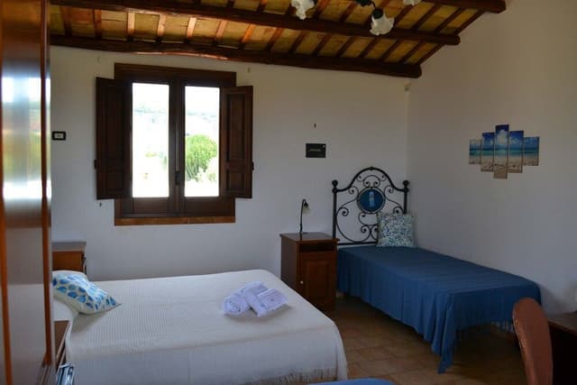 Deluxe Triple Room, Multiple Beds, Ensuite, Partial Sea View