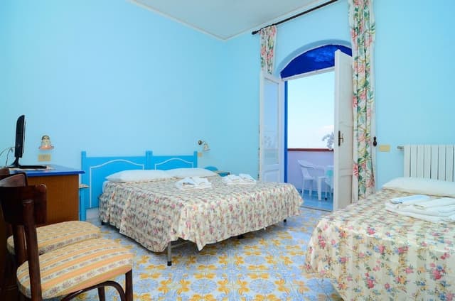 Economy Quadruple Room (Beach Access)