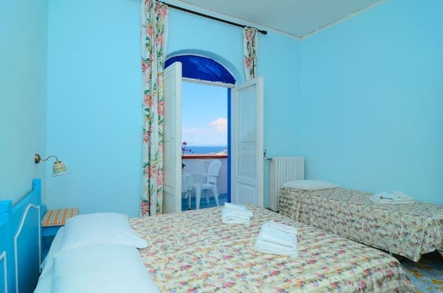 Economy Quadruple Room (Beach Access)