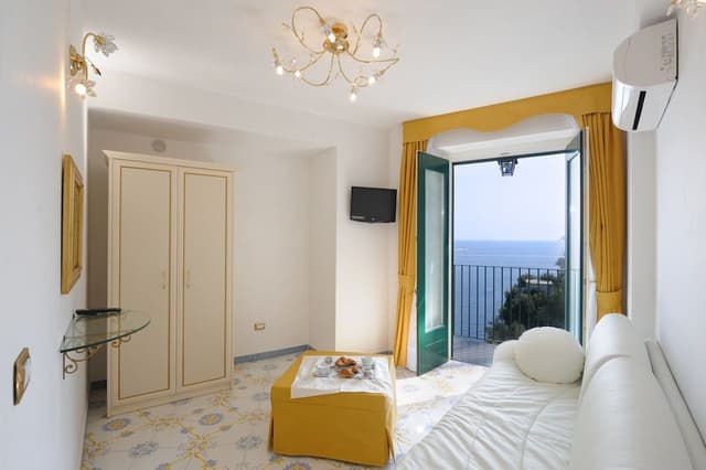 Suite, Sea View, Corner (French Balcony)