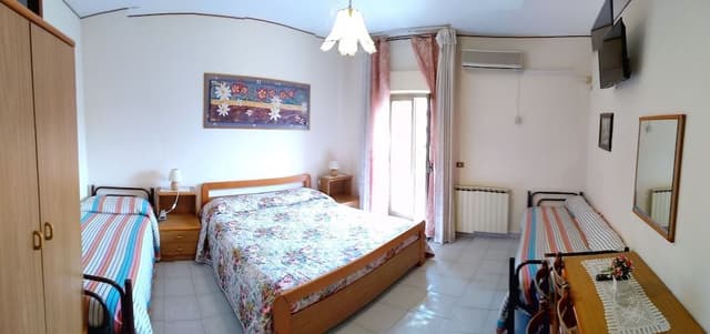 Double Room (with 2 extra beds)