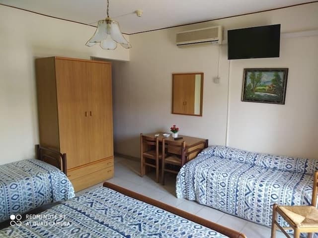 Double Room (with 2 extra beds)