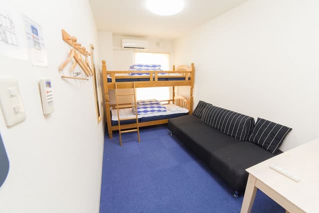 Twin Room with Sofa (Shared Bathroom)