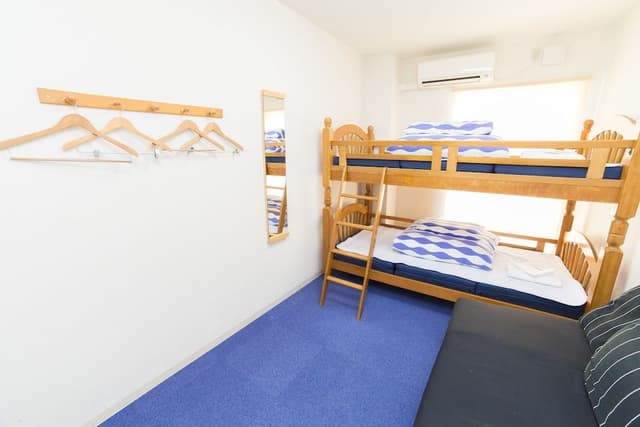 Twin Room with Sofa (Shared Bathroom)