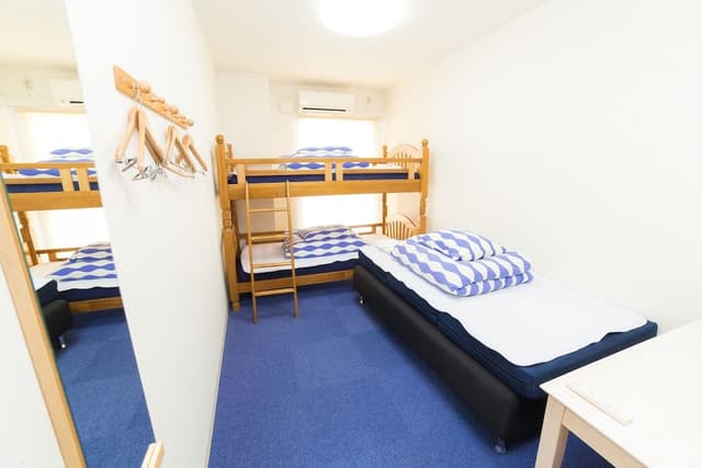Twin Room with Sofa (Shared Bathroom)
