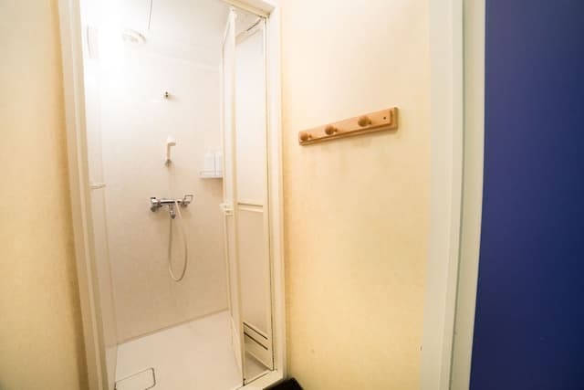 Twin Room with Sofa (Shared Bathroom)