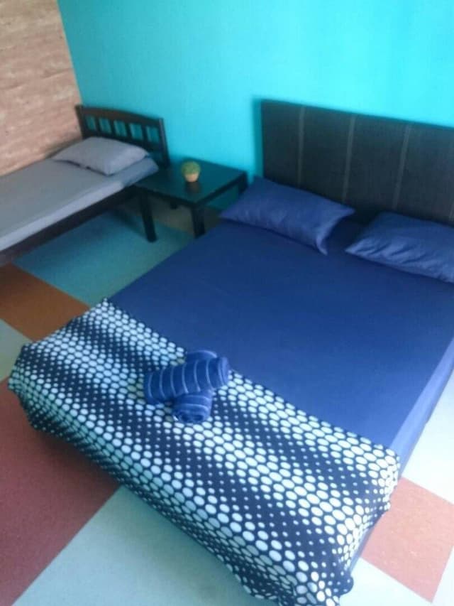 Triple Room, Shared Bathroom (With Fan)