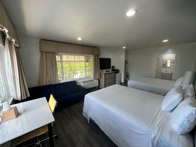 Deluxe Room Two Queen Beds and sofabed