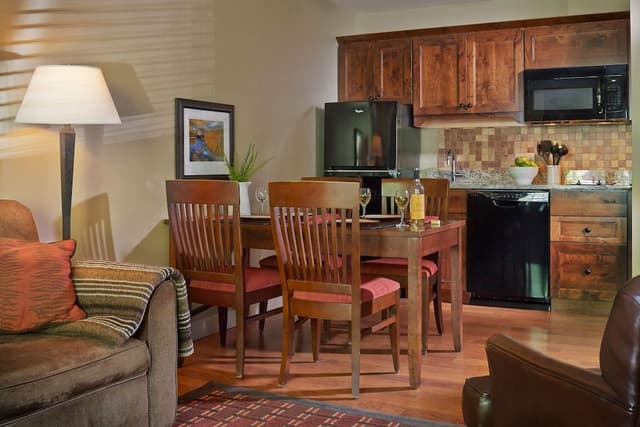 Fireplace Two-Bedroom, Two-Bath Suite - 1 King 2 Double Beds