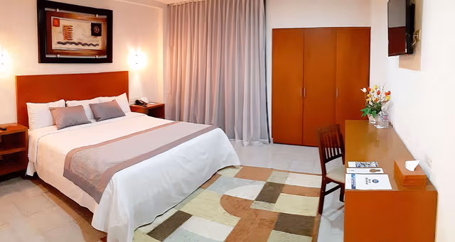 Suite-1 King Bed, Non-Smoking, Separate Living Area, High Speed Internet Access, Microwave And Refrigerator, Coffee Maker, Hairdryer