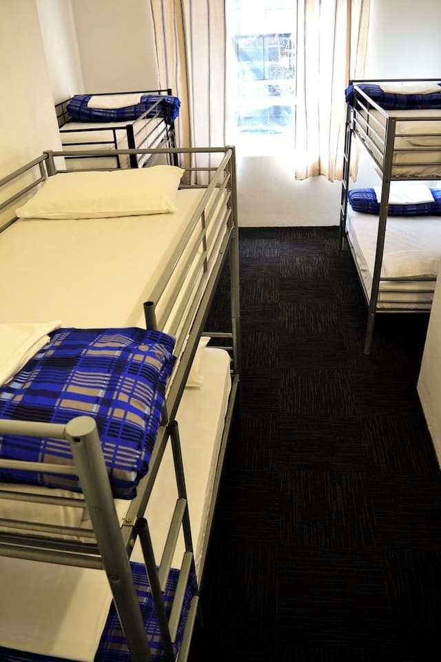 Bed in 6-Bed Female Dormitory Room with Shared Bathroom