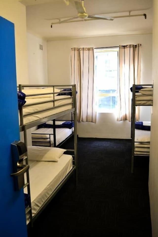 Bed in 6-Bed Female Dormitory Room with Shared Bathroom