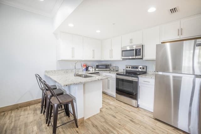 Standard Double Room, Kitchen (located across the street)
