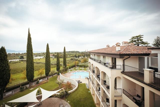 Superior Triple/Quadruple room with lake view balcony