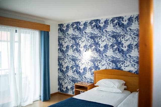 Twin Room with Partial Sea View
