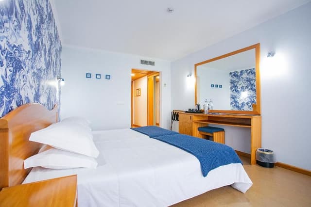 Twin Room with Partial Sea View