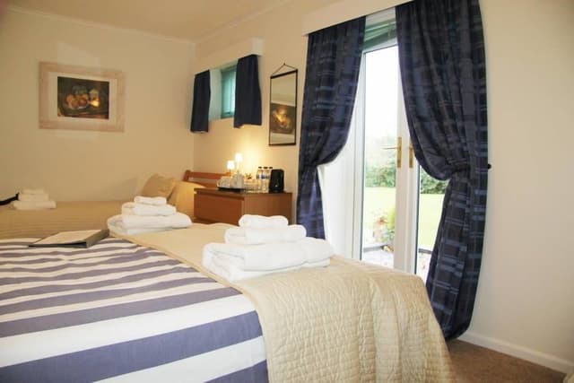 Family Room, Shared Bathroom (2 Adults + 2 Children)