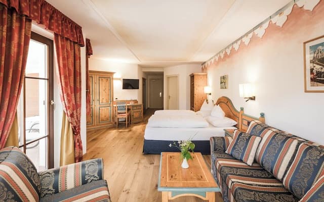 Comfort room with balcony and Dolomite view