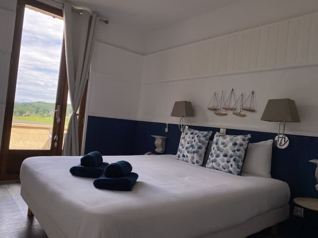 Chambre Triple Confort Terrasse Climatisée