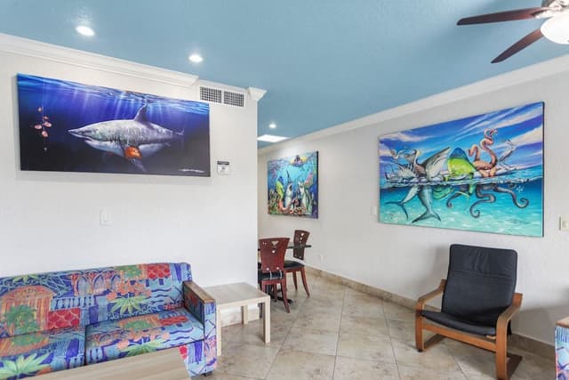 Deluxe One Bedroom Suite: 2 Queen Beds and 2 Sleeper Sofas
