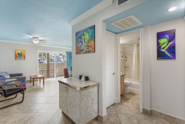 Deluxe One Bedroom Suite: 2 Queen Beds and 1 Sleeper Sofa