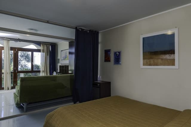 Suite, 1 Queen Bed (Capuana)