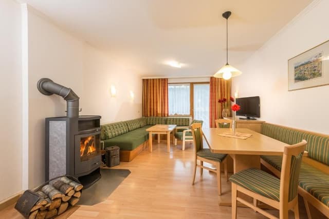 Superior Family Room with Balcony and Mountain View
