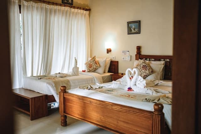 Deluxe Triple Room, 1 Bedroom, Refrigerator, Pool View