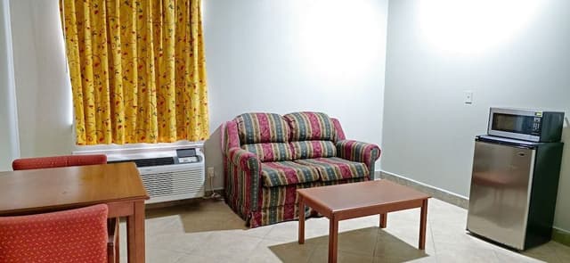 Business 2 Room Suite, 1 King Bed, Refrigerator & Microwave, Poolside