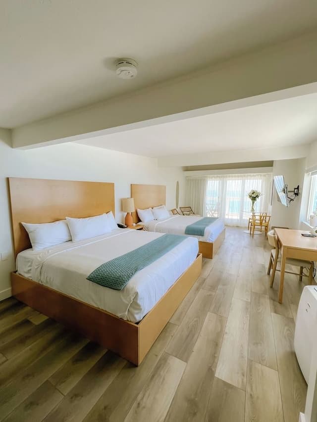 Suite, Multiple Beds, Oceanfront (Ocean Front Junior Suite 2 King Beds)