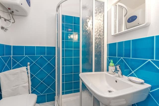 Family Apartment, Multiple Bedrooms, 2 Bathrooms (Erica Primo Piano 150m From the Beach)
